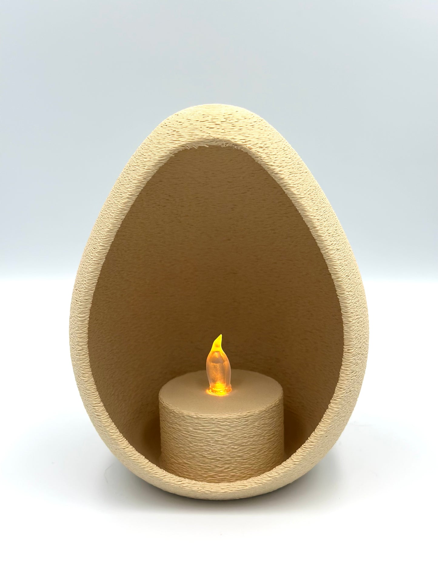 Egg-Shaped LED Tealight – Fuzzy Texture