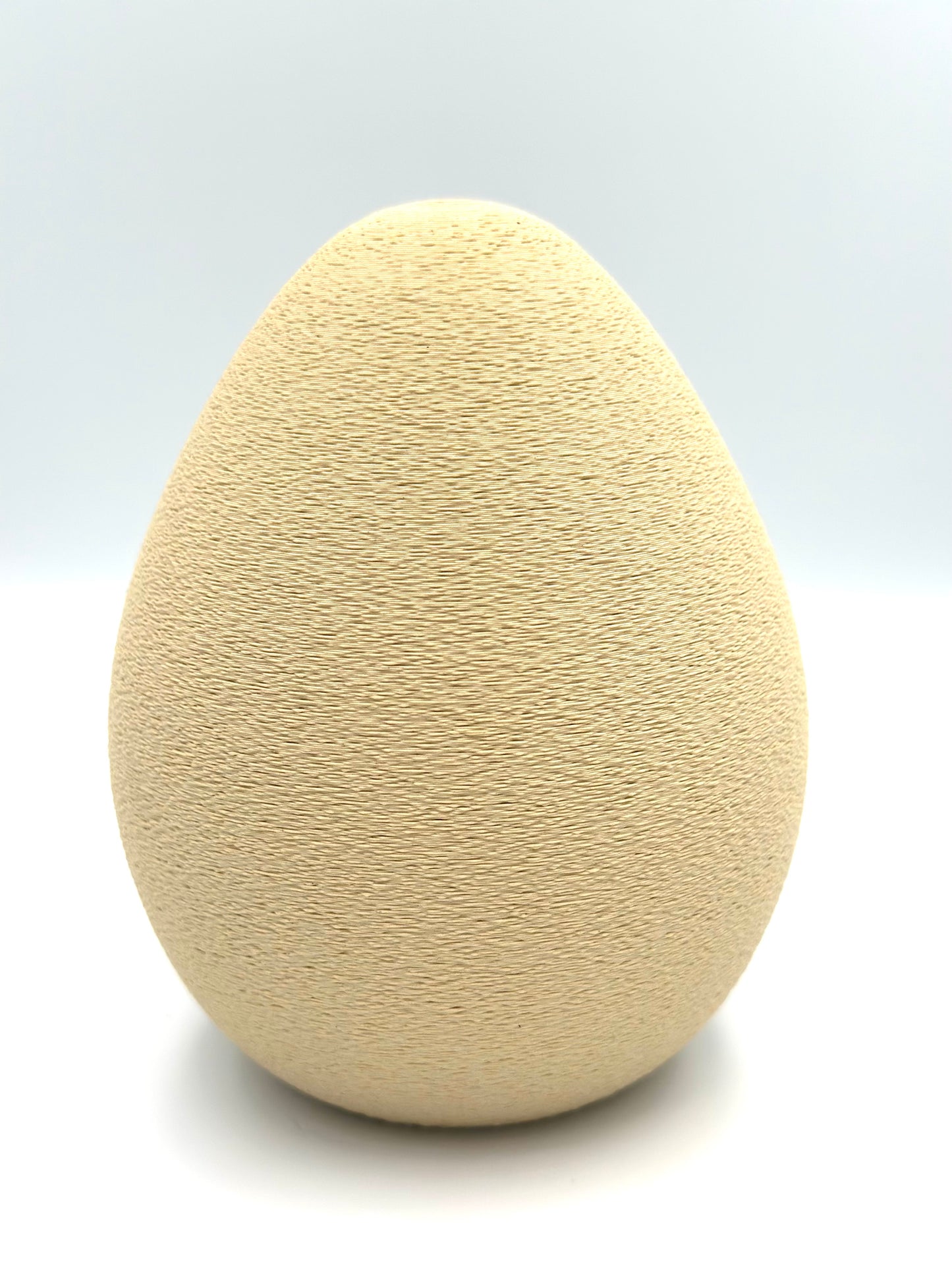 Egg-Shaped LED Tealight – Fuzzy Texture